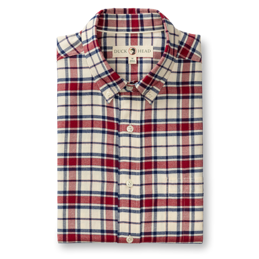 The Duck Head Cotton Flannel Sport Shirt features a classic red, blue, and white plaid, long sleeves, and a front pocket—making it the perfect go-to shirt for your next fall adventure.