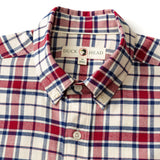 The Duck Head Cotton Flannel Sport Shirt features a classic red, blue, and white plaid design—making it the perfect cotton layer for all your fall adventures.