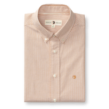 The Duck Head Cotton Oxford Sport Shirt Collins Stripe features orange and white vertical stripes, long sleeves, mechanical stretch, and an embroidered chest logo.