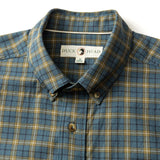 A blue and brown Cotton Wool Sport Shirt by Duck Head in Orion Blue plaid, featuring a button-down design and quality cotton wool with the "Duck Head" label on the inside collar.