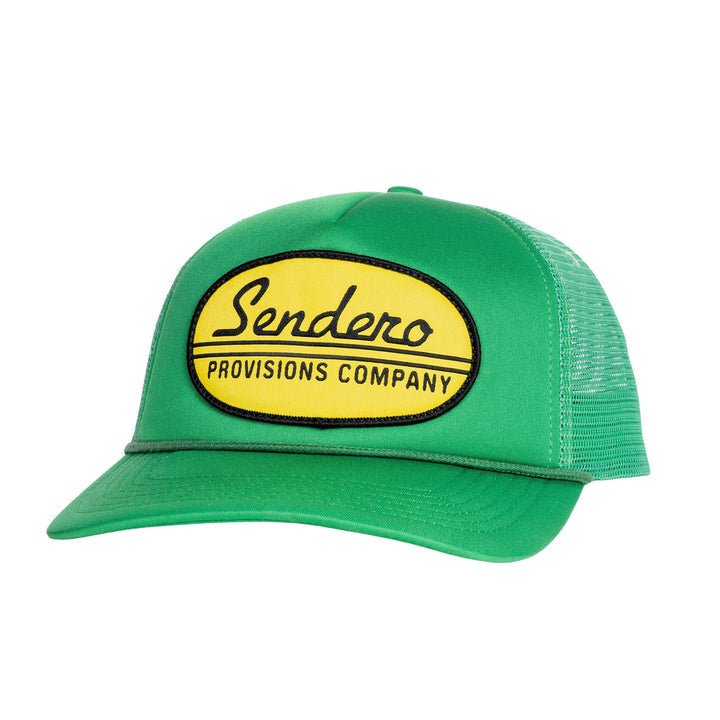 The Country Store Hat by Sendero Provisions Co. is a green vintage meshback trucker hat featuring a yellow oval patch with "Sendero Provisions Company" in black for a classic feed store style.