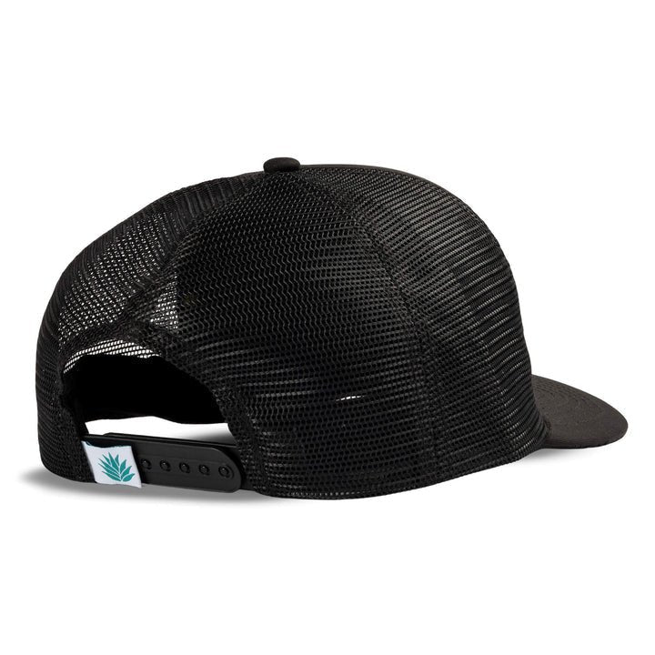 The Cowboy Hat by Sendero Provisions Co. is shown from the back, featuring an adjustable snap closure and a tag with a blue-green plant graphic—ideal for keeping your noggin cool in style.