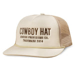 A beige and tan mesh trucker hat by Sendero Provisions Co., featuring "COWBOY HAT" and "Sendero Provisions Co. Trademark 2014" embroidered in brown on the front.