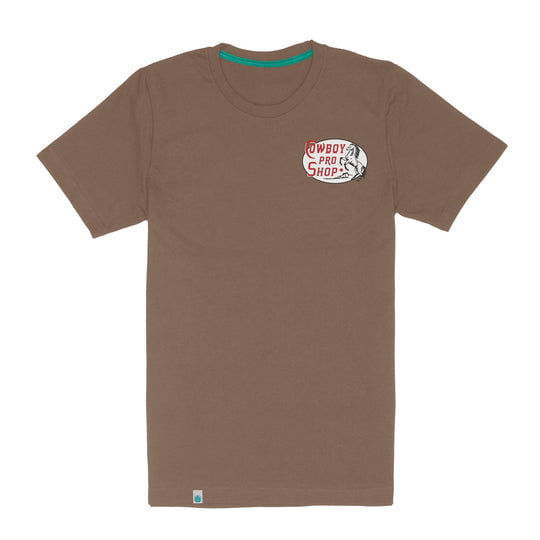 Show your Mississippi pride with the Cowboy Pro Shop T-Shirt by Sendero Provisions Co.—a brown short-sleeve tee featuring a small "Cowboy Pro Shop" logo and bull graphic on the left chest.