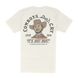 The Cowboys Don't Cry Pocket T-Shirt by Sendero Provisions Co. is a beige organic cotton tee featuring a soft touch screen print of a cowboy, “Cowboys Don’t Cry,” “It’s Just Dust,” and branded details.