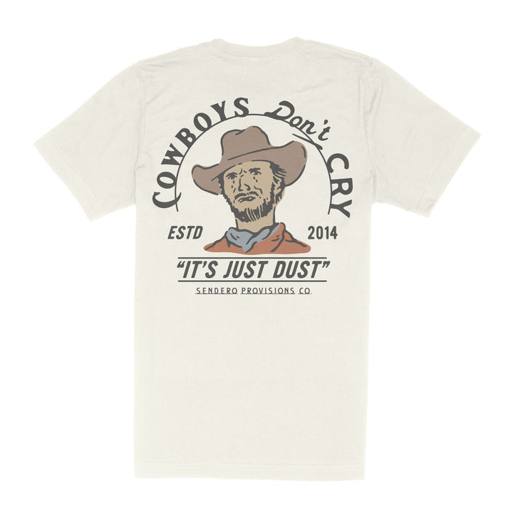 The Cowboys Don't Cry Pocket T-Shirt by Sendero Provisions Co. is a beige organic cotton tee featuring a soft touch screen print of a cowboy, “Cowboys Don’t Cry,” “It’s Just Dust,” and branded details.