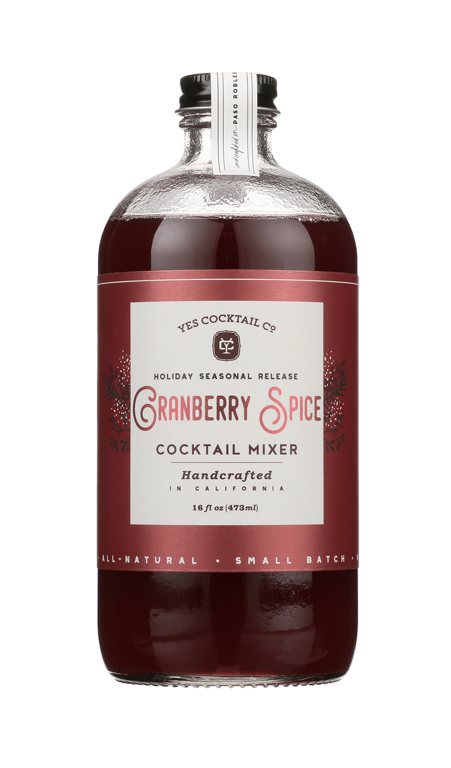 A 16 fl oz glass bottle of Cranberry Spice by Yes Cocktail Co., a handcrafted holiday cocktail mixer from California infused with mulling spices.