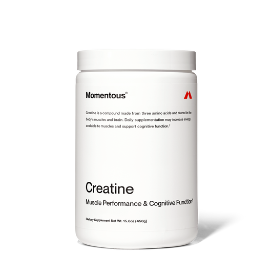 White container of momentous Creatine | Momentous supplement, labeled for muscle performance and cognitive function, with black and red text on a plain background.