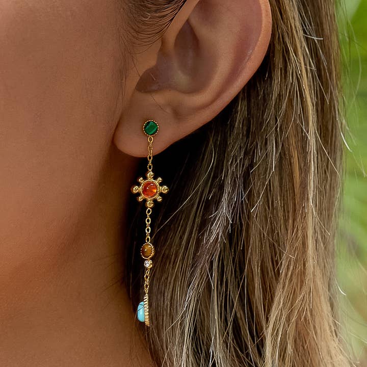 Bellevie Boho Gemstone Drop Earrings by Flanerie by MAIQ: 18K gold drop earring featuring a green stud and a tiered chain set with orange, brown, and blue boho gemstones.