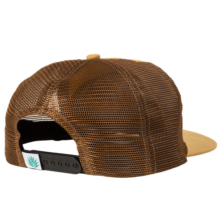The Daggum Hat by Sendero Provisions Co. is a brown mesh trucker hat with an adjustable snapback strap and a green plant logo tag at the back—the perfect go-to for any adventure.