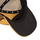 Close-up of the interior of a yellow and black Daggum trucker hat by Sendero Provisions Co., highlighting the brim, mesh paneling, and interior stitching.