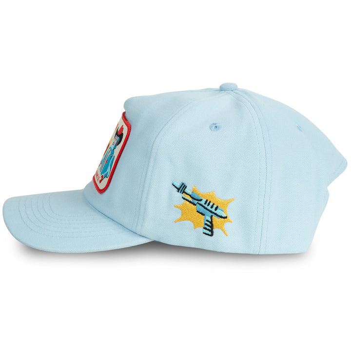 The Danger Cowboy Hat by Sendero Provisions Co. is a light blue cap featuring a colorful front patch and an embroidered gun with a yellow burst on the side—your ideal companion for Galactic West adventures.
