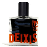 Deixis EDP by Fzotic is a clear glass perfume bottle with black liquid, bold orange "DEIXIS" lettering, a black cap, abstract designs, and an orange graphic, capturing rich notes of labdanum and sandalwood.
