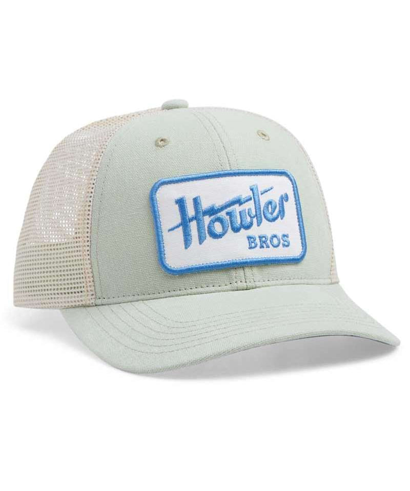 The Electric Standard Hat by Howler Brothers is a light green and white mesh adjustable hat with a blue and white "Howler Brothers" patch on the front.