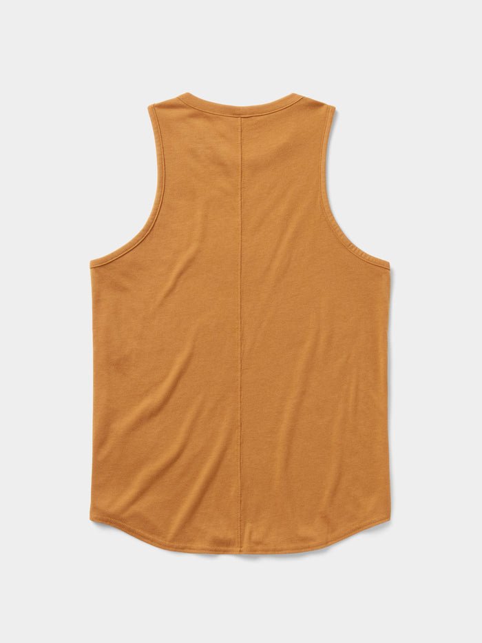 The Essential drirelease® Tank by Duck Camp, a sleeveless mustard quick-dry top, is laid flat and displayed from the back on a white background.