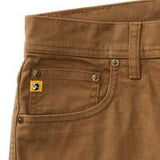 Close-up of the upper front section of Duck Head's Field Canvas Five-Pocket pants in brown, featuring a small yellow logo tag on the coin pocket and visible belt loops.