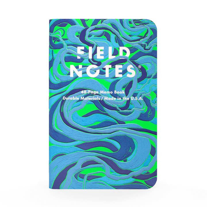 The Field Notes "Is a River Alive?" memo book features a blue and green swirled cover, contains 48 pages, is made of durable materials, and crafted in the USA by Field Notes.
