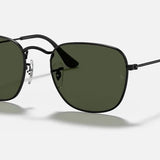 Ray-Ban Frank sunglasses featuring black metal frames with green lenses, thin arms, and adjustable nose pads.
