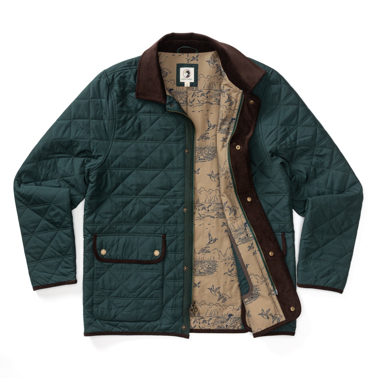 The Fremont Lodge Performance Quilted Jacket by Duck Head features a dark green quilted design, brown corduroy collar and trim, gold snap buttons, scenic beige lining, and lightweight PrimaLoft Insulation for warmth and comfort.