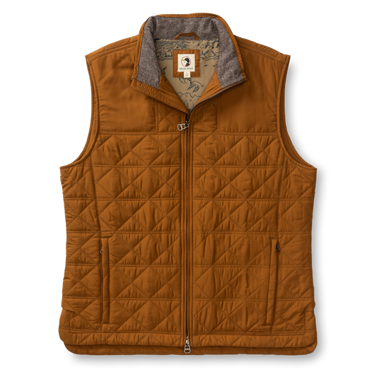 The Duck Head Fremont Sport Performance Quilted Vest features PrimaLoft Black Insulation, a front zipper, two side pockets, and a patterned inner lining—this lightweight brown vest is displayed on a white background.