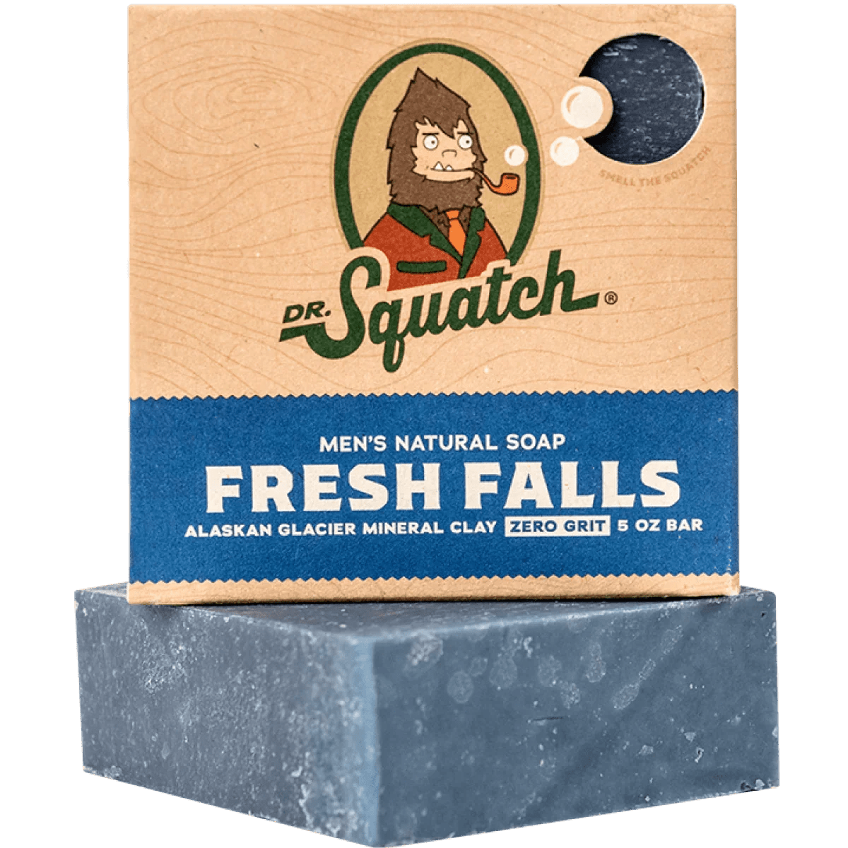 A box of Dr.Squatch Bar Soap in Fresh Falls stands behind an unboxed blue bar, featuring "Alaskan Glacier Mineral Clay" and "Zero Grit" on its packaging, for a clean, refreshing shower experience.