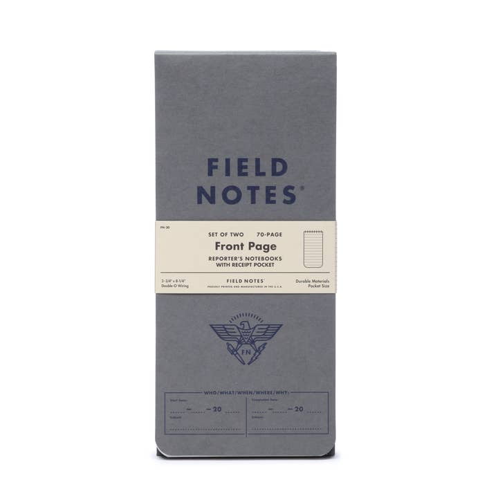 The Field Notes Front Page 2-Pack includes two reporter’s notebooks with gray Neenah covers, Double-O-Binding, 70 college-ruled pages each, a pocket, and visible branding on the packaging.