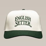 Ballad Originals Bird Dog Series Hat | English Setter, a white baseball cap with a dark green brim and “English Setter” embroidered in green, crafted with Texas craftsmanship.
