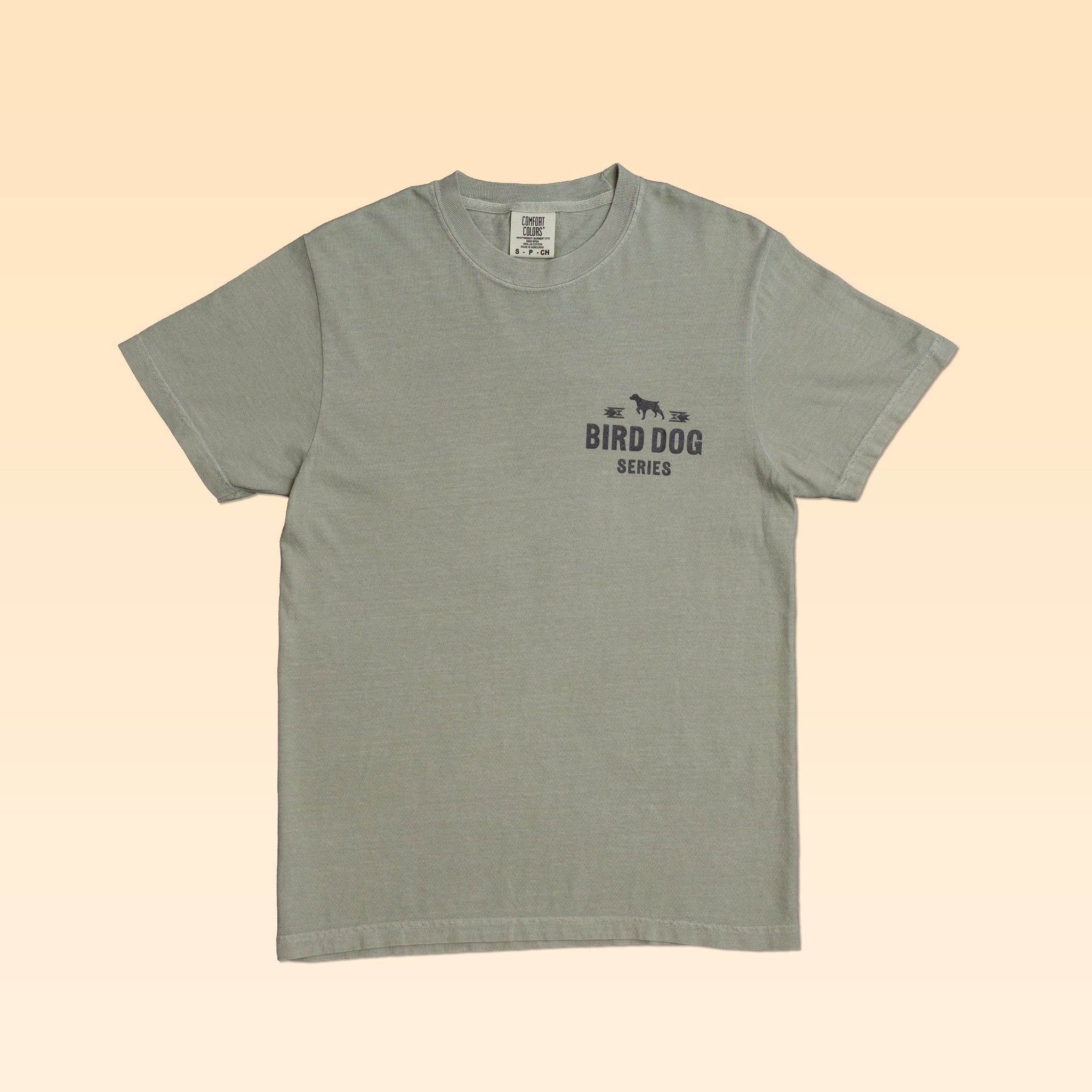 Sage green Ballad Originals Bird Dog Series Shirt | Brittany crew neck t-shirt with “BIRD DOG SERIES” and a dog silhouette printed on the left chest.