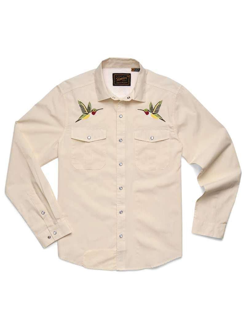 The Gaucho Snapshirt | Nectar Seekers by Howler Brothers is a cream long-sleeve shirt with snap buttons and embroidered hummingbirds on the chest pockets, inspired by classic western shirts.