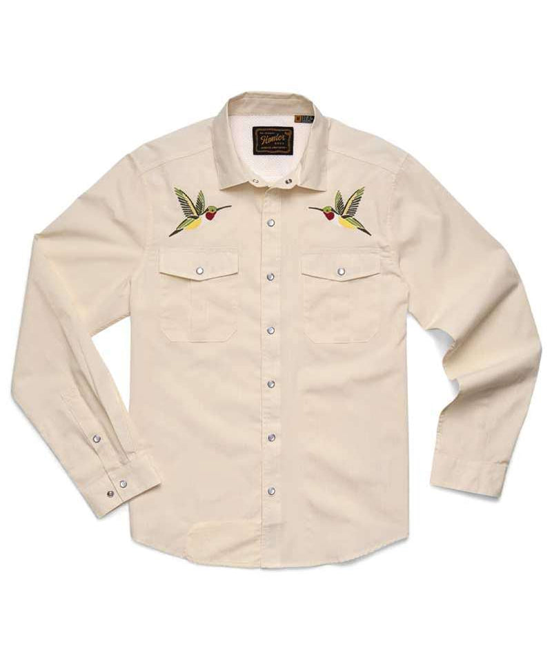 The Gaucho Snapshirt | Nectar Seekers by Howler Brothers is a cream long-sleeve shirt with snap buttons and embroidered hummingbirds on the chest pockets, inspired by classic western shirts.