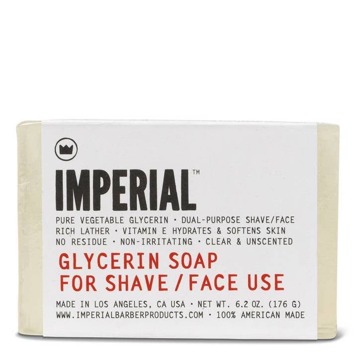 Imperial Barber Products Glycerin Shave/Face Soap Bar is dual-purpose for shave and facial cleansing, unscented, made in the USA, and lists moisturizing benefits and ingredients on the package.