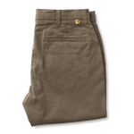 A pair of Duck Head Gold School Chino pants with belt loops, a back pocket, and a small yellow logo above the pocket is displayed folded on a white background.