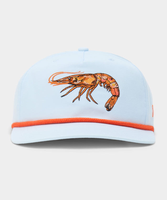 The Duck Camp Grandpa Hat Gulf Shrimp features a light blue 5-panel design, an embroidered orange shrimp on the front, orange brim trim, and an adjustable snapback for a perfect fit.
