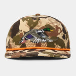 The Duck Camp Grandpa Hat | Mallard features a camo pattern, embroidered flying duck on the front, orange cord above the brim, and an adjustable snapback for comfort.