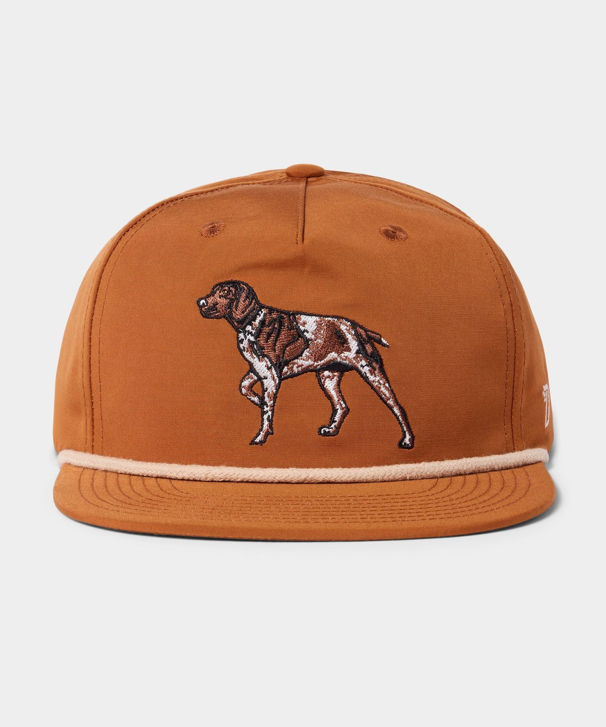 The Duck Camp Grandpa Hat | Pointer is a rust-colored 5-panel cap with an embroidered brown and white dog on the front and an adjustable snapback for a comfortable fit.