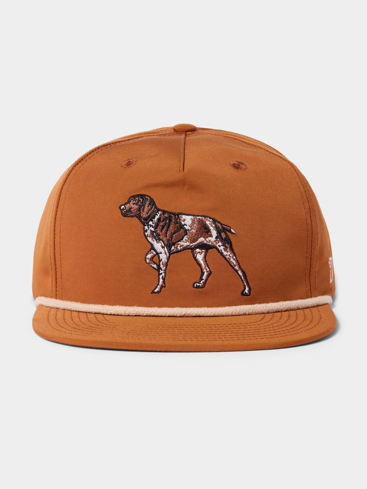 The Duck Camp Grandpa Hat | Pointer is a rust-colored 5-panel cap with an embroidered brown and white dog on the front and an adjustable snapback for a comfortable fit.