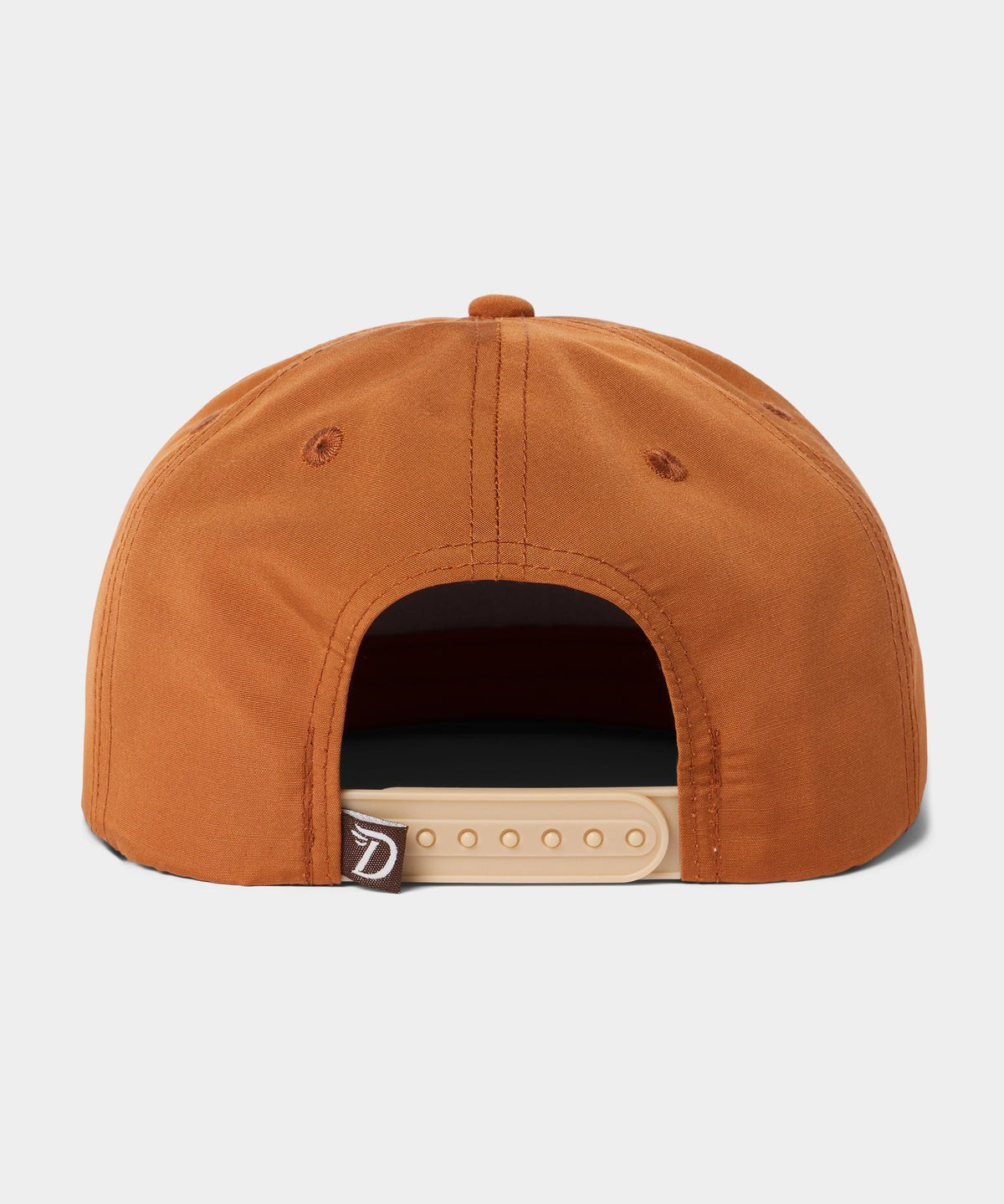 The Grandpa Hat | Pointer by Duck Camp is a brown, classic 5-panel hat viewed from the back, featuring a beige adjustable snapback strap and a small logo tag on the left side.
