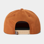 The Grandpa Hat | Pointer by Duck Camp is a brown, classic 5-panel hat viewed from the back, featuring a beige adjustable snapback strap and a small logo tag on the left side.