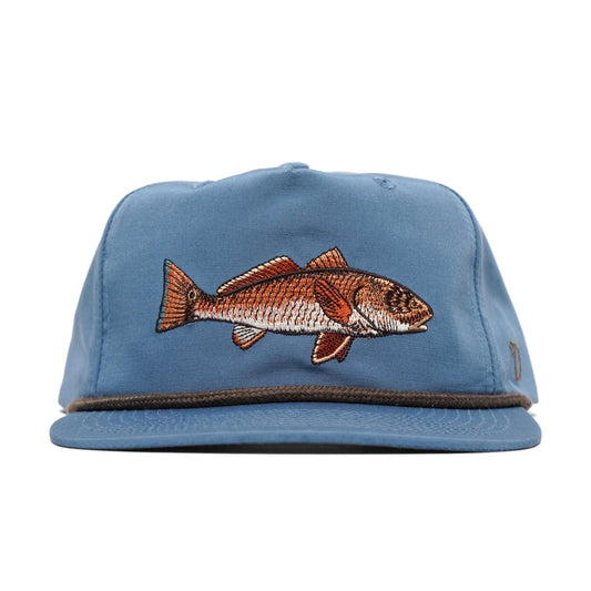 The Grandpa Hat | Redfish by Duck Camp is a blue embroidered snapback with a fish design on the front, black rope above the brim, and an adjustable closure—perfect as a stylish Redfish hat.