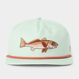 The Duck Camp Grandpa Hat Redfish is a light green 5-panel snapback with an embroidered redfish on the front, orange cord above the brim, and an adjustable snapback for a custom fit.