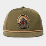 The Grandpa Hat | Turkey by Duck Camp features an embroidered turkey design, olive green color, tan cord trim above the brim, two top ventilation holes, and an adjustable snapback for a custom fit.