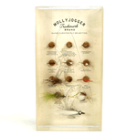 The Guide Curated Fly Set by Mollyjogger is a display case featuring twelve hand-tied, labeled flies for fly fishing, neatly arranged under the heading “Mollyjogger Trademark Brand Guide-Curated Fly Selection.”.