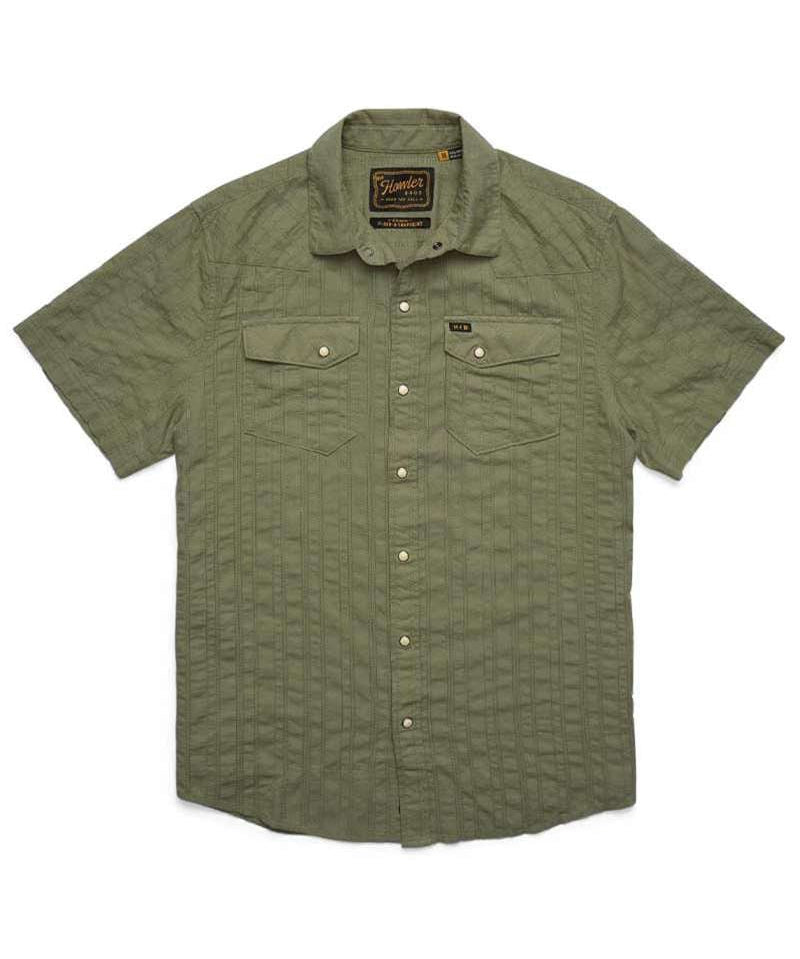 The H Bar B Snapshirt by Howler Brothers is an olive green, short-sleeve button-up with pearl snaps, two chest pockets, and a textured vertical stripe pattern.
