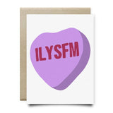 Handy Heart-ILYSFM by Anvil Cards is a blank greeting card with a hand-drawn purple candy heart and red "ILYSFM" letters, printed on sustainable linen paper.