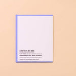 The Happy Birthday Icons Card by And Here We Are is a white letterpress card with black "AND HERE WE ARE" text, shown on a blue envelope against a beige background.