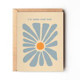 The "Here For You" greeting card by Daydream Prints features a blue and orange floral illustration with "I'M HERE FOR YOU" on the cover, displayed against a white background.