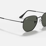 A pair of Ray-Ban 3548 Hexagonal Flat Arista sunglasses with a black metal frame, flat crystal lenses, and thin arms is displayed on a white background.