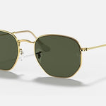 Ray-Ban 3548 Hexagonal Flat Arista sunglasses feature gold frames, green flat crystal lenses, and thin metal arms, displayed on a white background.