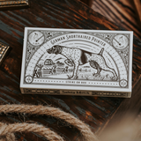 A box of Mollyjogger Hounds Safety Matches featuring vintage-style German Shorthaired Pointer artwork and labeled breed details.