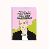 The Knees Weak Valentine's Card by Party Mountain Paper co. features a serious man in a black jacket with "You make my palms sweaty, knees weak, arms spaghetti" on a colorful background. A2 size, made in Canada.
